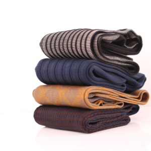 four pairs of over the calf mens socks.